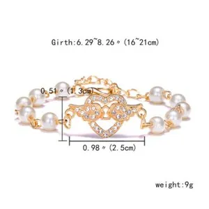 Authentic Heart of Protection: Gold Plated Pearl Rhinestone Winged Heart Bracelet
