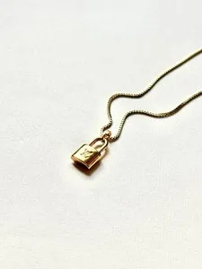 Authentic Louis Vuitton Gold Plated LV Lock Pendant on Chain/Necklace