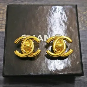 Authentic Celestial CC Lock Earrings – Gold‑Plated Aura of Chanel