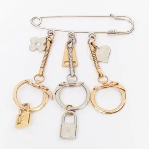 Authentic LOUIS VUITTON palladium gold plated safety pin keyring LV lock heart charms
