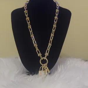 Authentic The Golden Cipher of Boundless Union: 14K Gold Plated CZ Paved Triple Lock Pendant