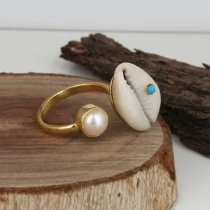 Authentic Whispers of the Ocean's Bounty: 18k Gold Plated Cowrie Shell Ring