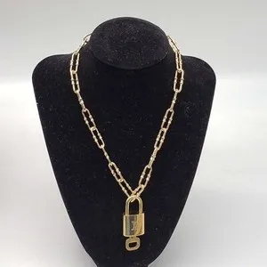 Authentic The Gilded Guardian: Louis Vuitton Lock & Key Talisman Necklace