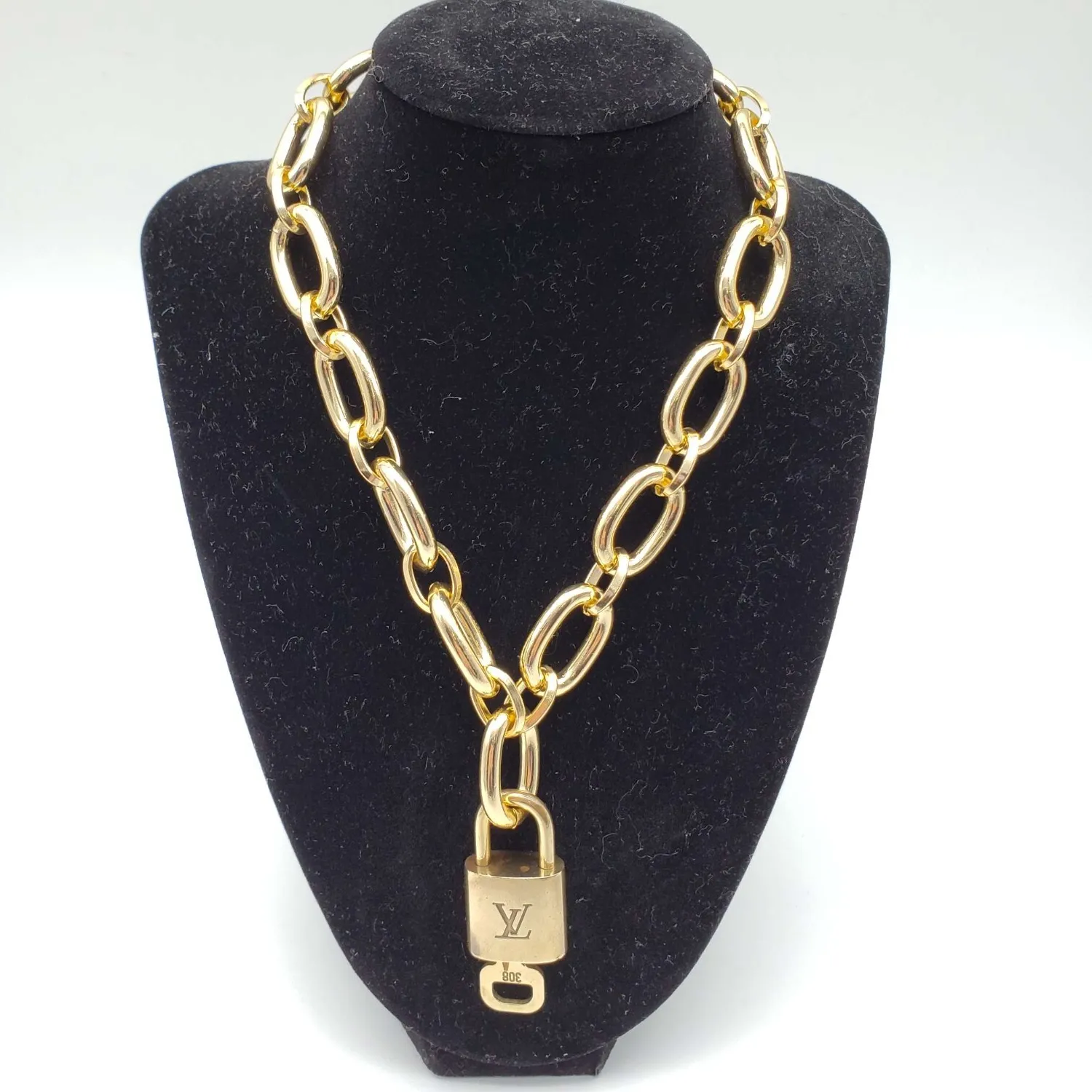 Authentic The Gilded Guardian: Louis Vuitton Lock & Key Talisman