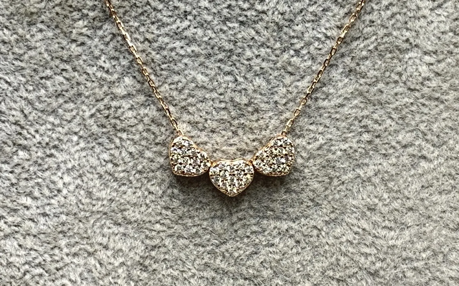 Authentic Triple Heart Harmony: A Rose Gold Plated Shield of Unconditional Love