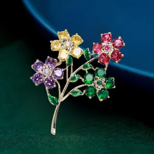Authentic Celestial Bloom: Gold‑Plated CZ Flower & Leaf Brooch