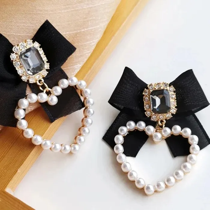 Authentic Midnight Reverie: The Obsidian Heart and Gilded Bow Earrings