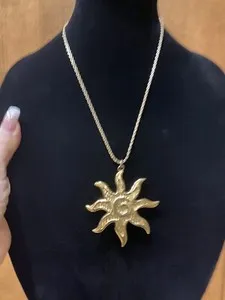 Authentic Celestial Sun Amulet – Vintage Gold‑Plated Givenchy Radiance