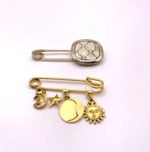 Authentic Lot of 2 Gold Plated Brooch Sun Moon Star Faux Marble Enamel Set