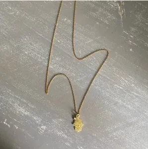 Authentic Chakra Hand Charm Necklace: A Golden Conduit of Healing Energy