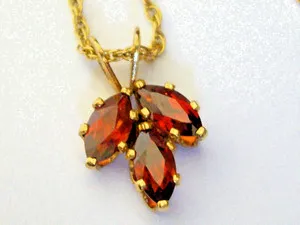 Authentic Eternal Flame: Garnet's Blazing Heart on Golden Threads