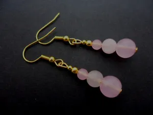Authentic A PAIR OF PINK JADE BEAD GOLD PLATED DANGLY EARRINGS. .