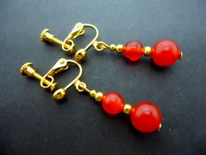 Authentic A PAIR OF RED JADE GOLD PLATED DROP DANGLY SCREW BACK CLIP ON EARRINGS. .