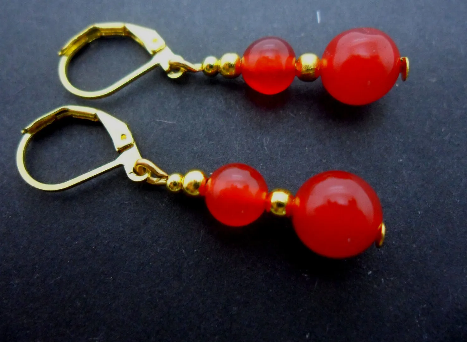 Authentic A PAIR OF RED JADE GOLD PLATED DROP DANGLY LEVERBACK HOOK EARRINGS. .