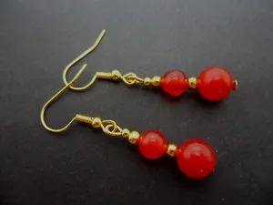 Authentic A PAIR OF RED JADE GOLD PLATED DROP DANGLY EARRINGS. .
