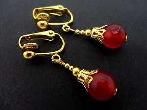 Authentic A PAIR OF SHORT DANGLY RED JADE GOLD PLATED CLIP ON EARRINGS.