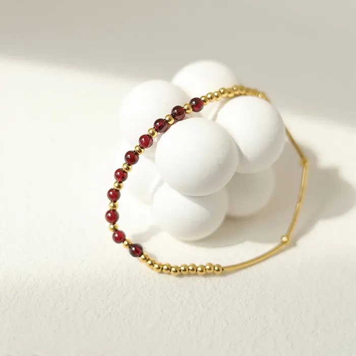 Authentic Guardian's Embrace: Wine Red Garnet Gold Ball Bend Pipe Stretch Bracelet