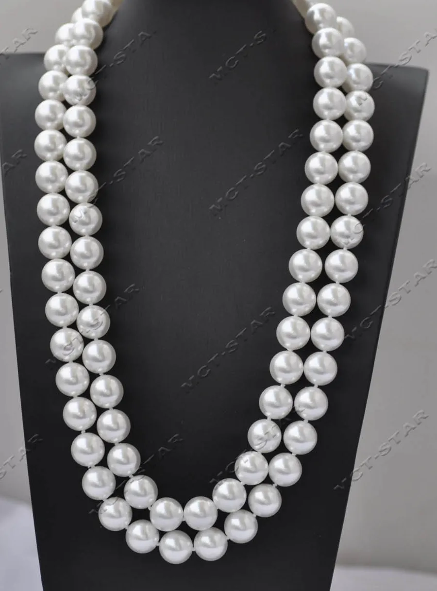 Authentic Radiant Luminescence: The 50-Inch South Sea Shell Pearl and Cubic Zirconia Sovereign Strand