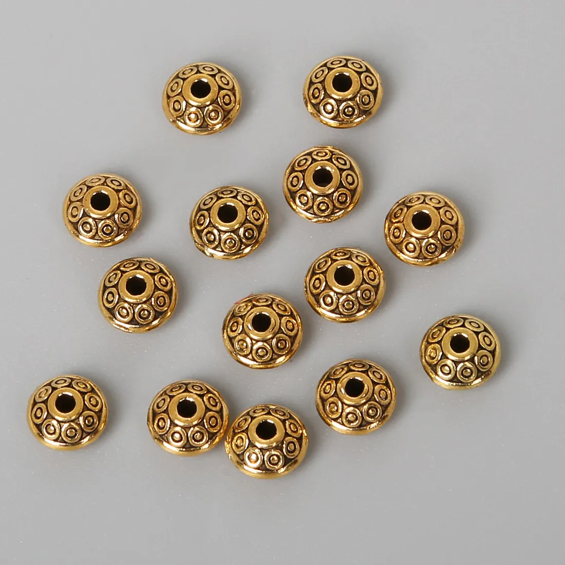 Authentic Radiant Cone-Patterned Alchemical Spacer Beads