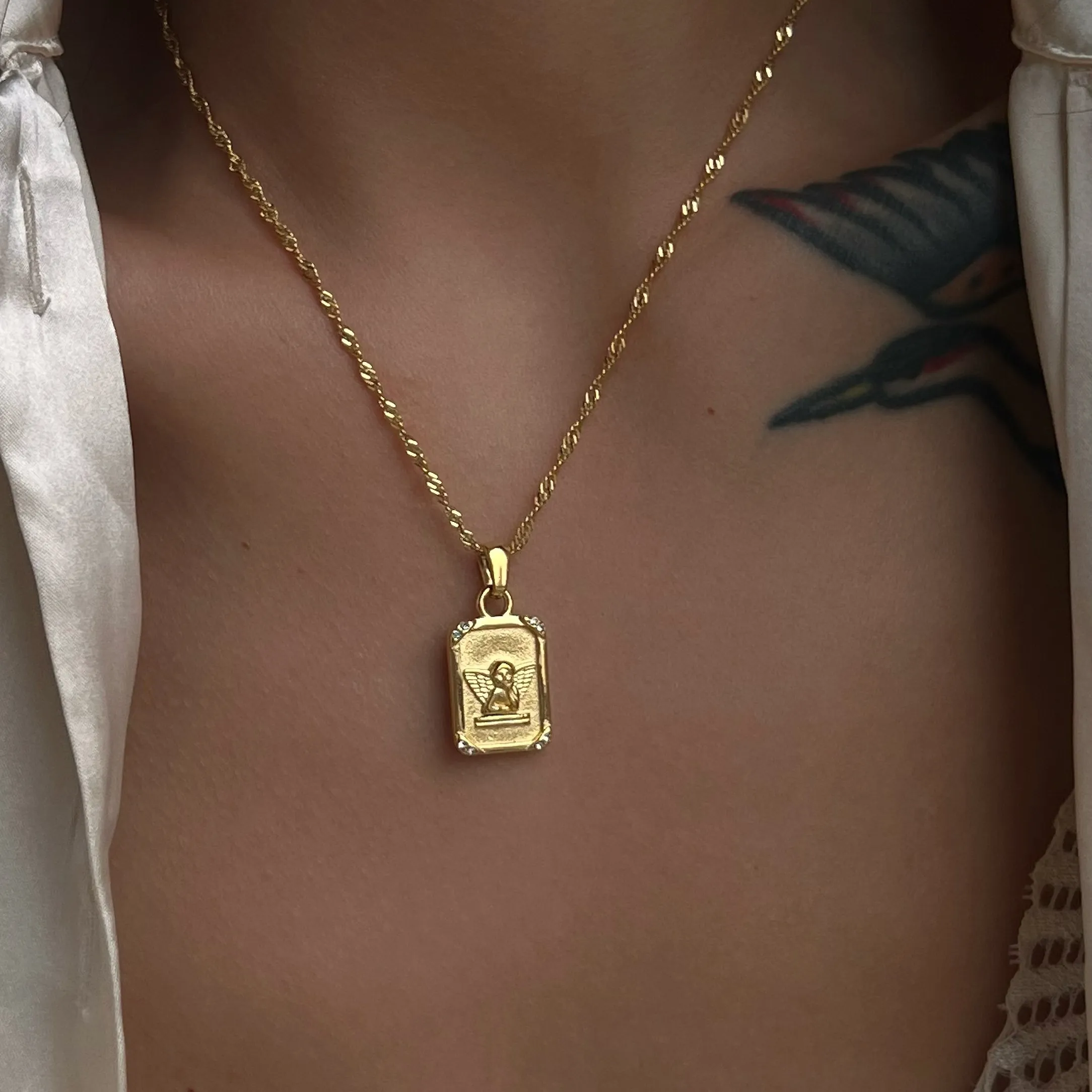Authentic The Celestial Cherub's Gaze: An 18k Gold Amulet of Devotion