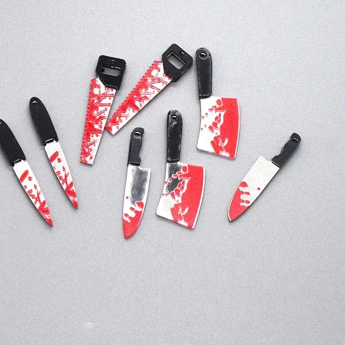 Authentic Macabre Curiosities: The Veiled Blade and Saw Charms