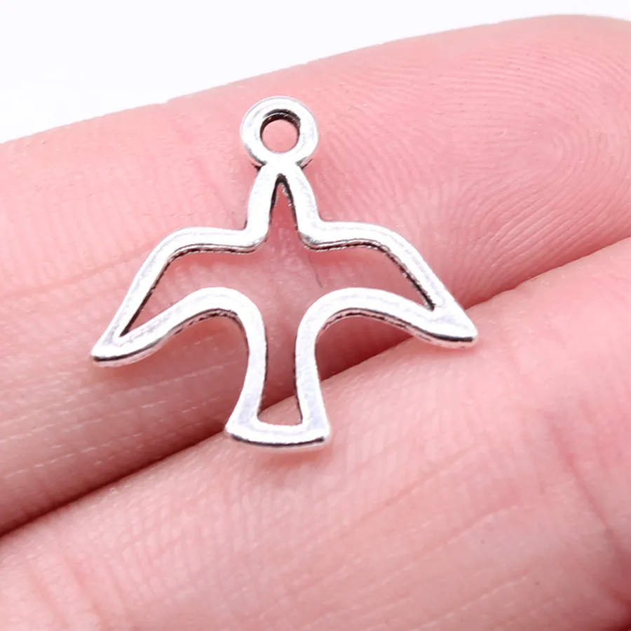 Authentic WYSIWYG 20pcs 18x18mm Antique Silver Color Hollow Dove Of Peace Charms Pendant For DIY Jewelry Making Jewelry Craft Findings