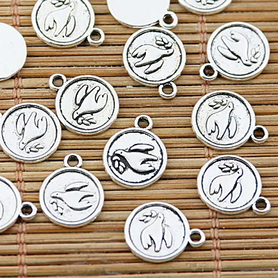 Authentic 50pcs 9.9mm hole 1.4mm tibetan silver tone round peace dove pattern charms EF1573