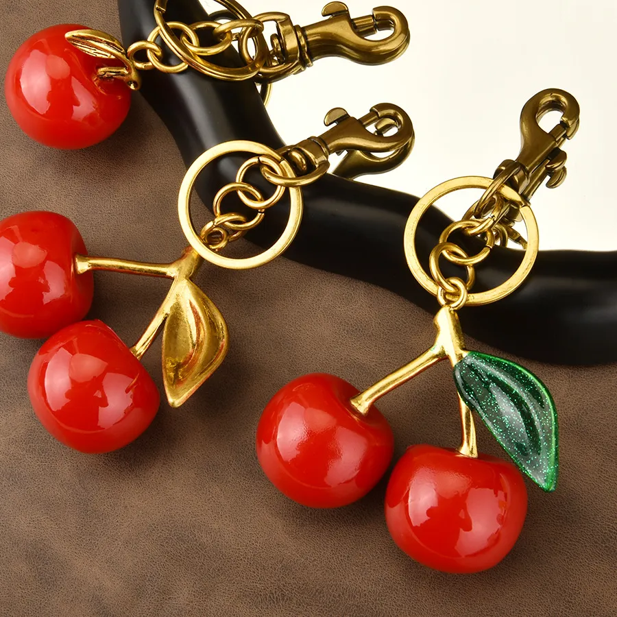 Authentic Lovely Green Leaf Red Cherry Bag Pendant Key Chain Fashion Resin Cherry Seed Solid Color Red Apple Fruit Keychain Trinket Women