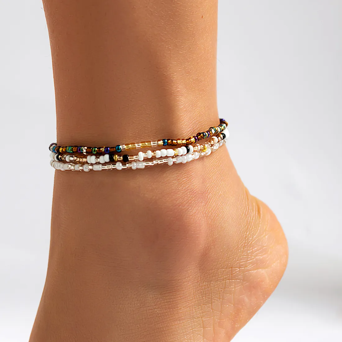 Authentic Tapestry of the Sunlit Tides: Bohemian Multicolor Beaded Anklets