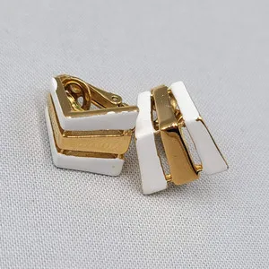 Authentic Vintage Trifari Clip on Earrings Signed Gold Plated White Enamel 5/8"