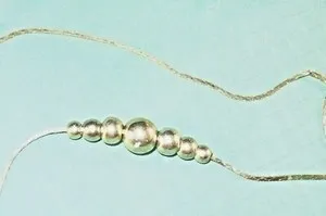 Authentic The Golden Continuum Slide-a-Bead Talisman