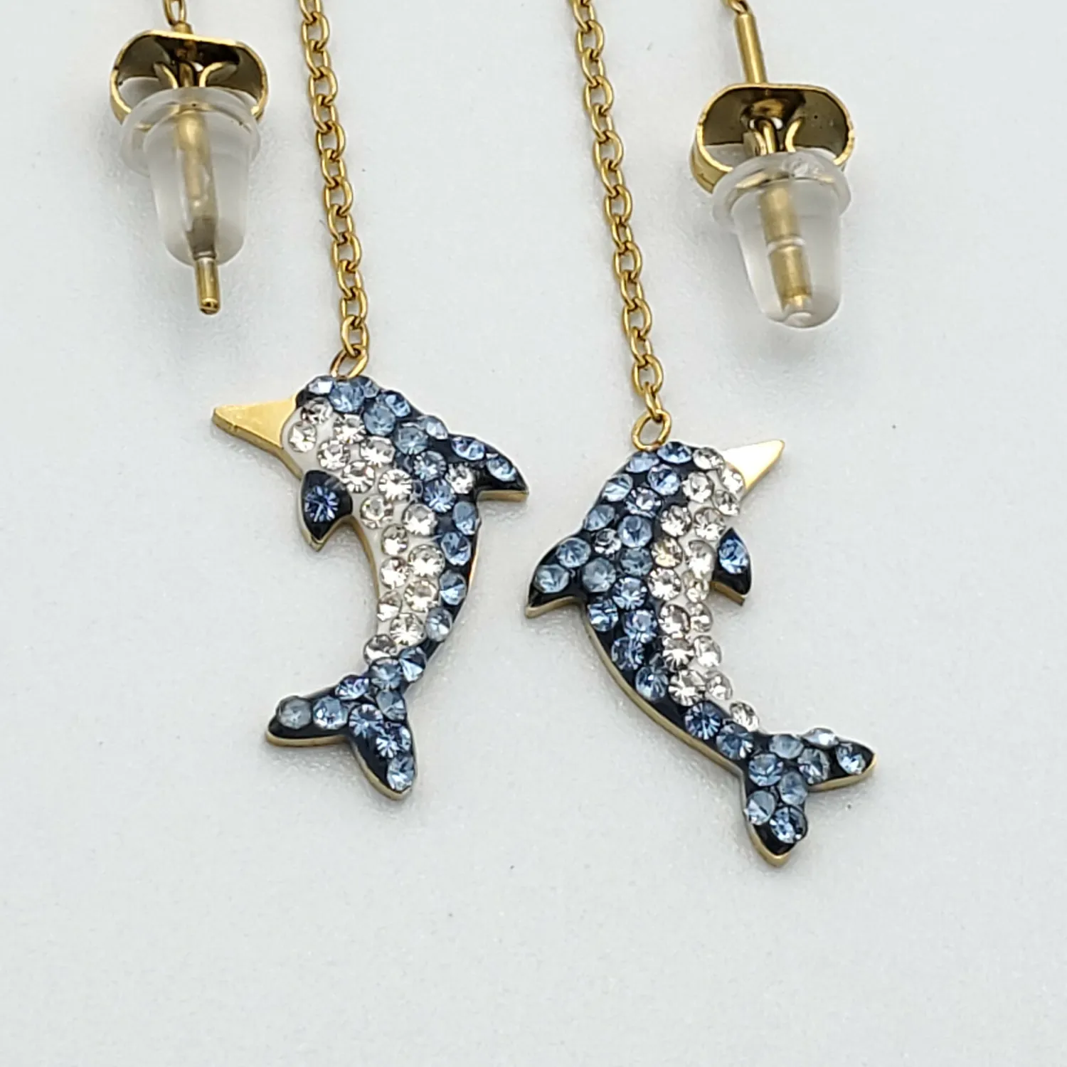 Authentic Gold Plated Thread Slide Dolphin Earrings with blue crystals.