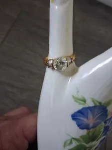 Authentic 14kt. Gold Plated Round Cut Clear Stone Ring with Side Baguette Accents-Size 7.5