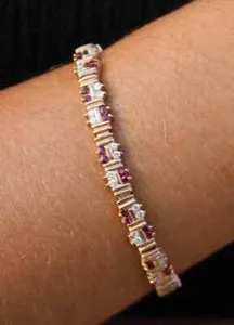 Authentic The 14k Yellow Gold Plated Tennis Bracelet with Simulated Ruby: A Talisman of Love and Fortune