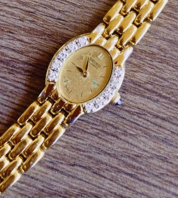 Authentic Celestial Radiance: Diamond-Kissed Gold Plated Timekeeper