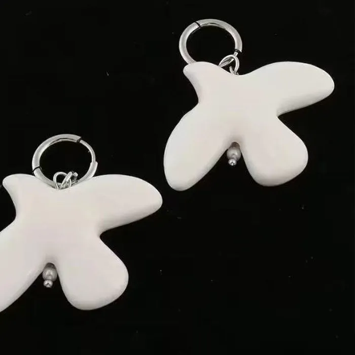 Authentic Wings of Harmony: Ceramic Peace Dove Talisman Beads (Set of 10)