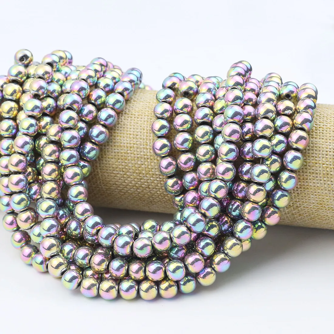 Authentic Prismatic Earth Shield: Smooth Round Colorful Hematite Strands