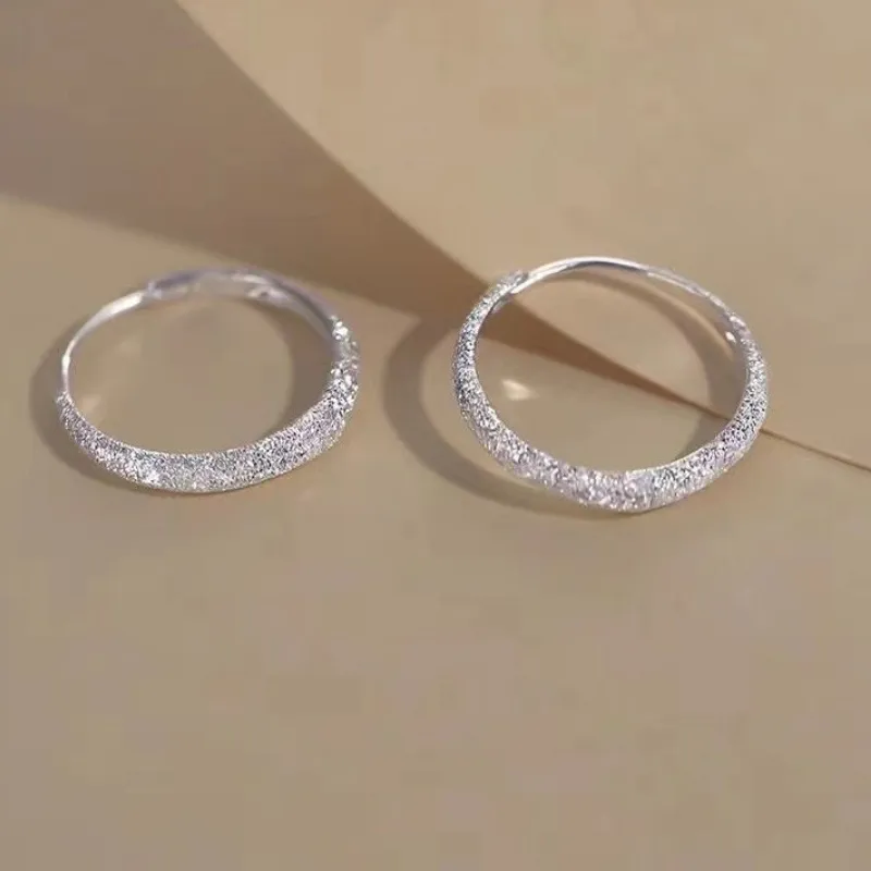 Authentic Celestial Stardust Hoops: A Symphony of Frosted Light
