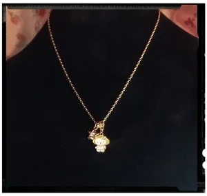 Authentic Celestial Hello Kitty Radiant Gold Star Talisman