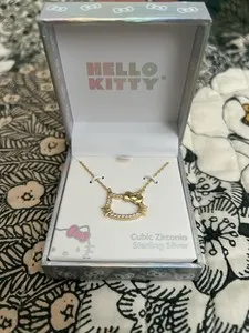 Authentic Celestial Charm: Gold-Plated Hello Kitty Amulet of Joy