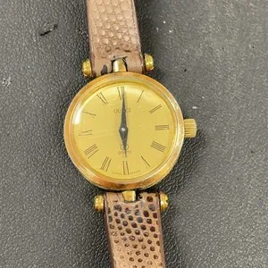 Authentic The Golden Chronometer of Fading Hours - Gucci Ladies Gold-Plated Mini Timepiece