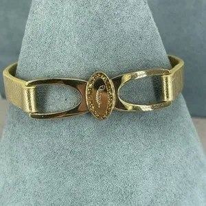 Authentic Aspinal of London bracelet feather motif gold plated leather buckle