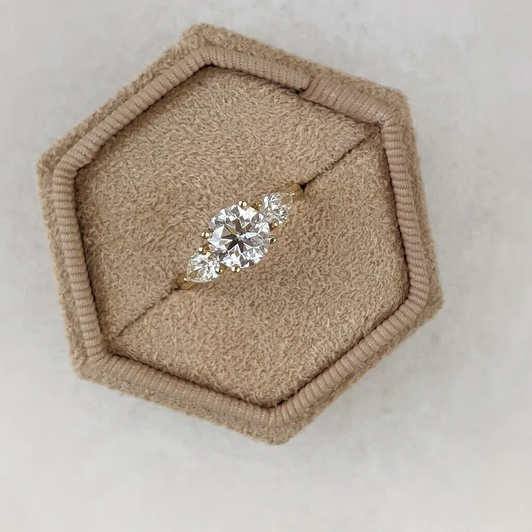 Authentic Amulet of Elegance: A Solitaire Trinity of Moissanite and Golden Light