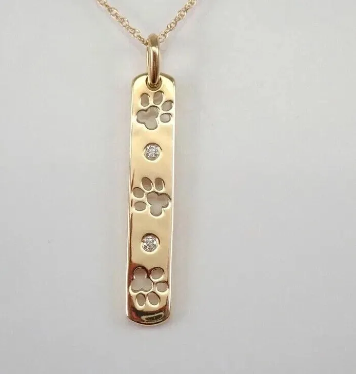 Authentic The Celestial Companion: 0.10 Ct Lab-Grown Diamond Paw Print Talisman in 14k Yellow Gold Over 925 Sterling Silver