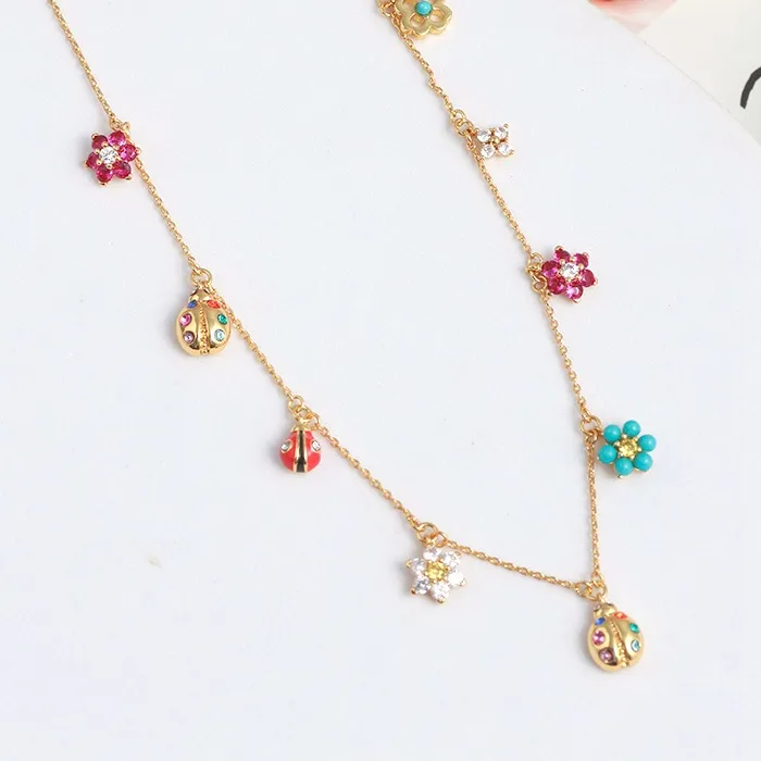 Authentic Blossoming Fortune: Golden Ladybug Charms and Flower Petals Necklace