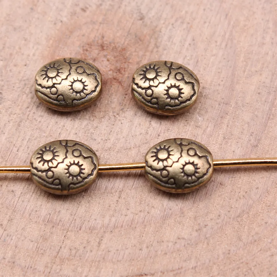 Authentic Sun's Gentle Radiance: 50pcs 7x6x3mm Gold-Toned Sun Charms