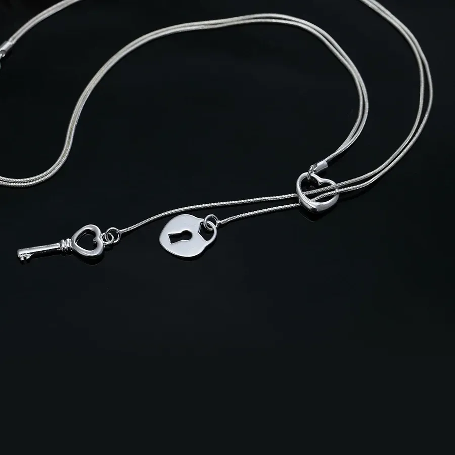 Authentic The Keeper of Hearts: Sterling Silver Lock and Key Talisman