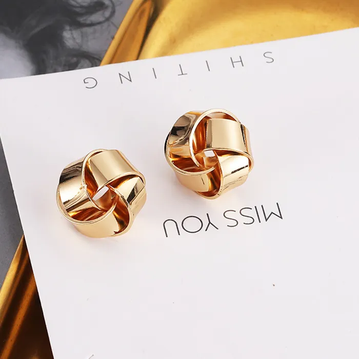Authentic Whispers of the Windmill: Twisted Floral Earrings for the Free-Spirited