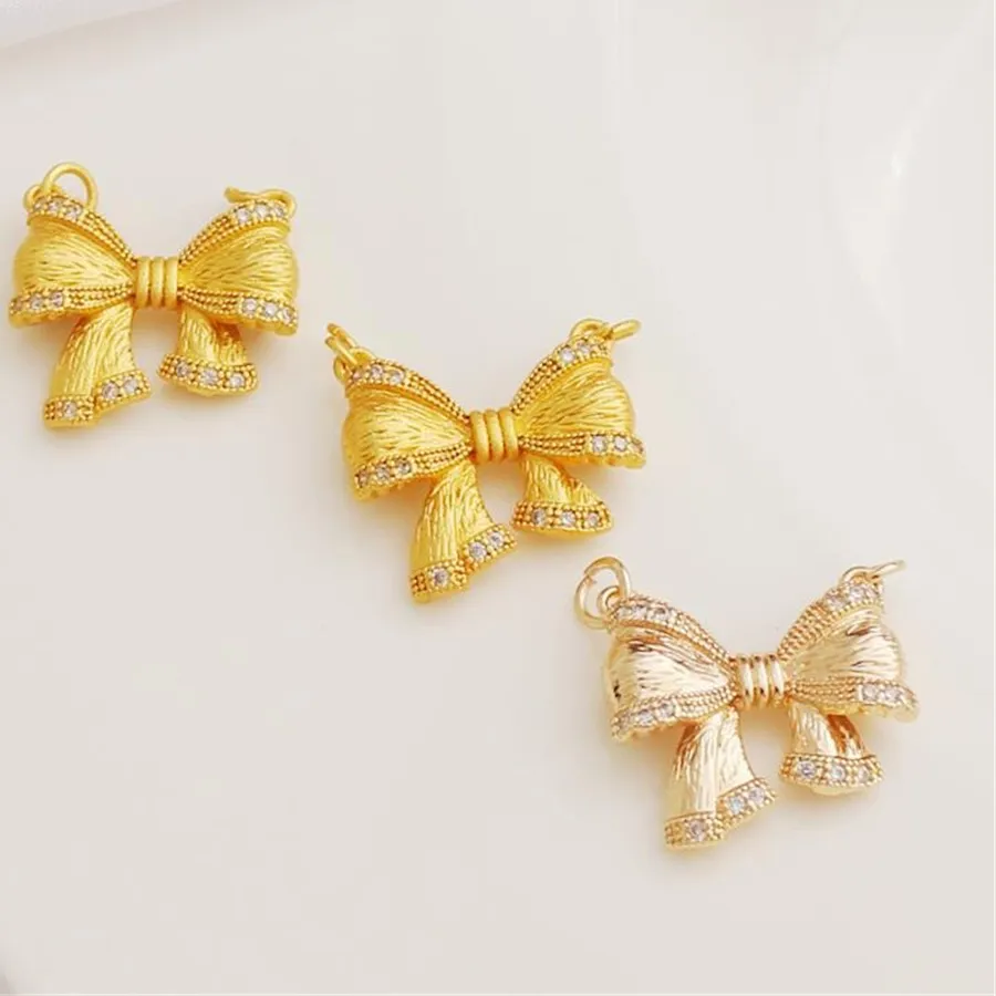 Authentic The Gilded Knot of Grace: 18k Gold-Plated Bow Talisman