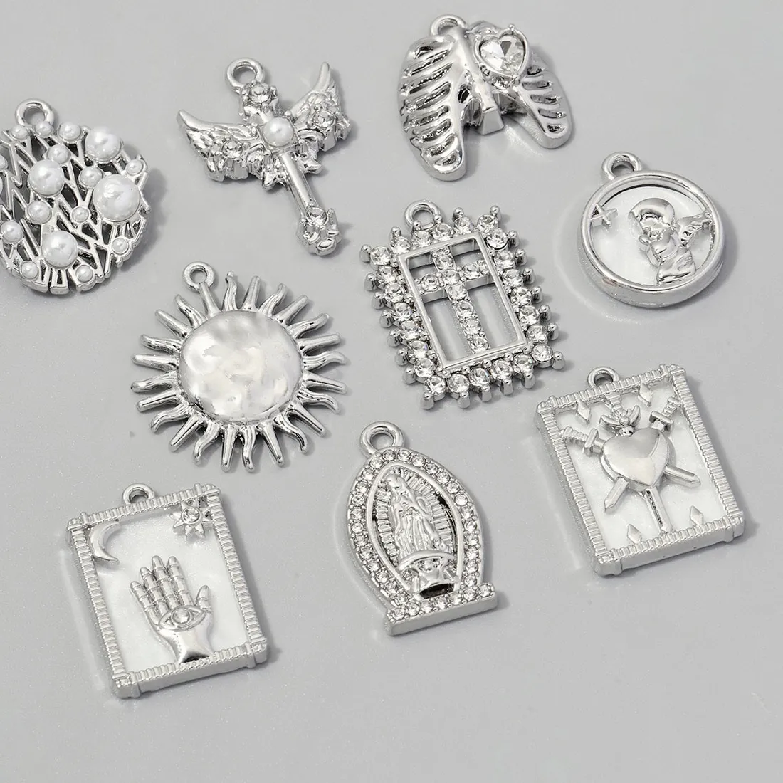 Authentic Heptad of Devotion: Celestial Wings, Sacred Crosses, and Pendants of the Heart